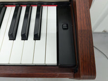 Load image into Gallery viewer, Yamaha Clavinova CLP-220 digital piano and stool in mahogany finish stock number 24340
