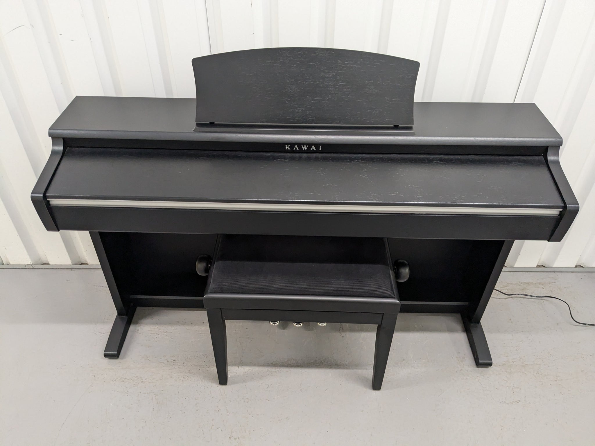 Kawai CN23 digital piano and stool in satin black finish stock number –  Sulinda Music