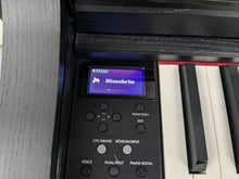 Load image into Gallery viewer, Yamaha Clavinova CLP-735 in satin black with stool and manuals stock nr 24354
