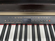 Load image into Gallery viewer, Yamaha Clavinova CLP-930 Digital Piano in dark rosewood finish stock #24342
