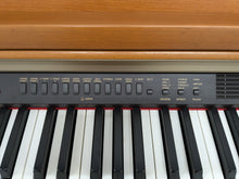 Load image into Gallery viewer, Yamaha Clavinova CLP-950 Digital Piano and stool in cherry wood finish stock nr 24357
