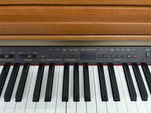 Load image into Gallery viewer, Yamaha Clavinova CLP-950 Digital Piano and stool in cherry wood finish stock nr 24357
