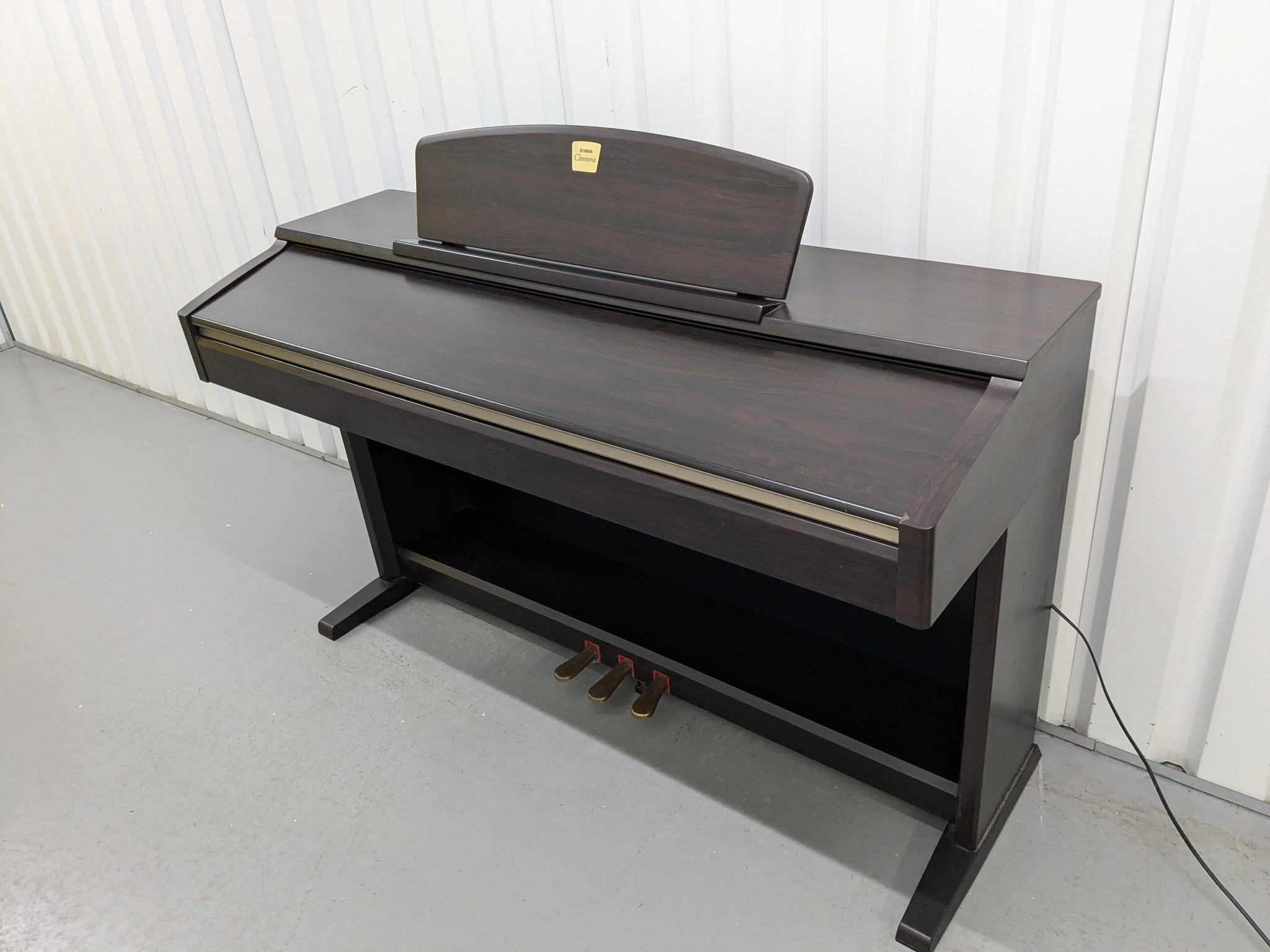 Yamaha Clavinova CLP-130 Digital Piano in dark rosewood stock #24358 –  Sulinda Music