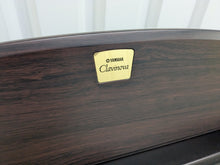 Load image into Gallery viewer, Yamaha Clavinova CLP-130 Digital Piano in dark rosewood stock #24358
