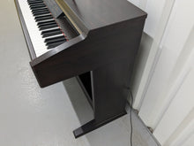 Load image into Gallery viewer, Yamaha Clavinova CLP-130 Digital Piano in dark rosewood stock #24358
