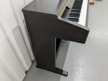 Load image into Gallery viewer, Yamaha Clavinova CLP-130 Digital Piano in dark rosewood stock #24358
