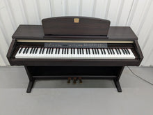 Load image into Gallery viewer, Yamaha Clavinova CLP-130 Digital Piano in dark rosewood stock #24358
