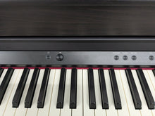 Load image into Gallery viewer, Roland HP702 Concert Class Digital Piano and stool in rosewood stock #24398
