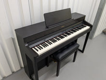 Load image into Gallery viewer, Roland HP702 Concert Class Digital Piano and stool in rosewood stock #24398
