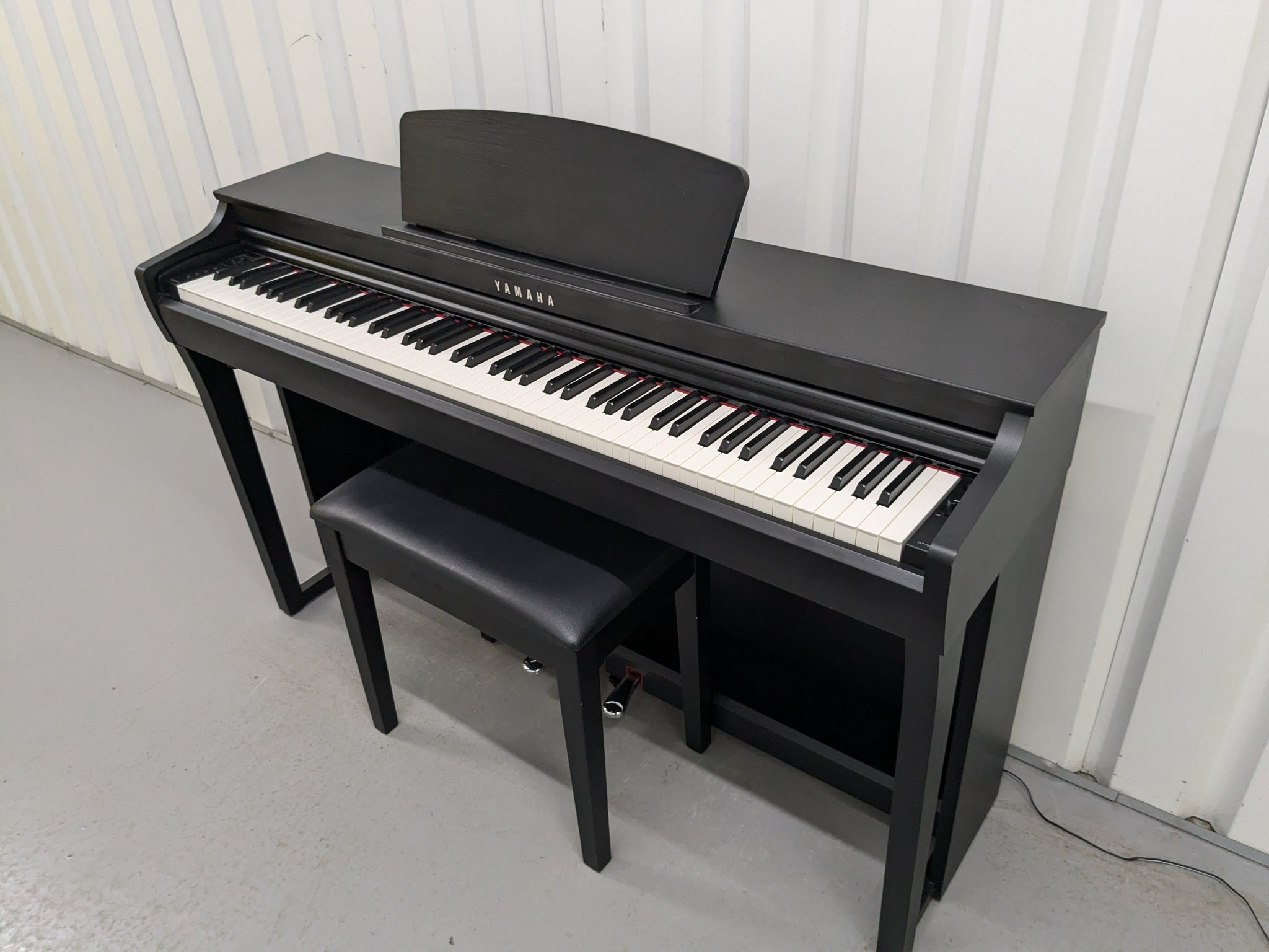 Yamaha clavinova CLP-725 digital piano and stool in satin black