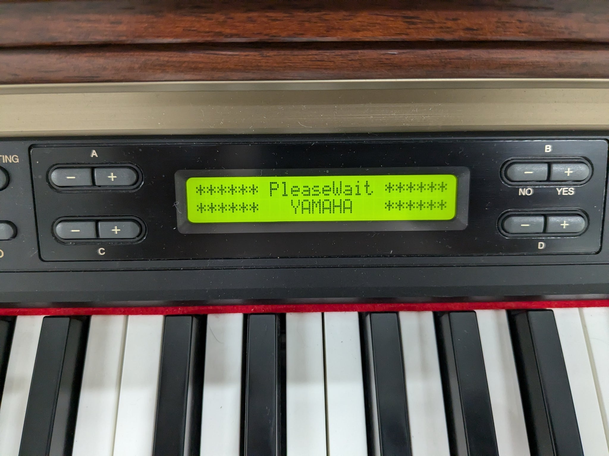 Yamaha Clavinova CLP-150 digital piano and stool in mahogany stock