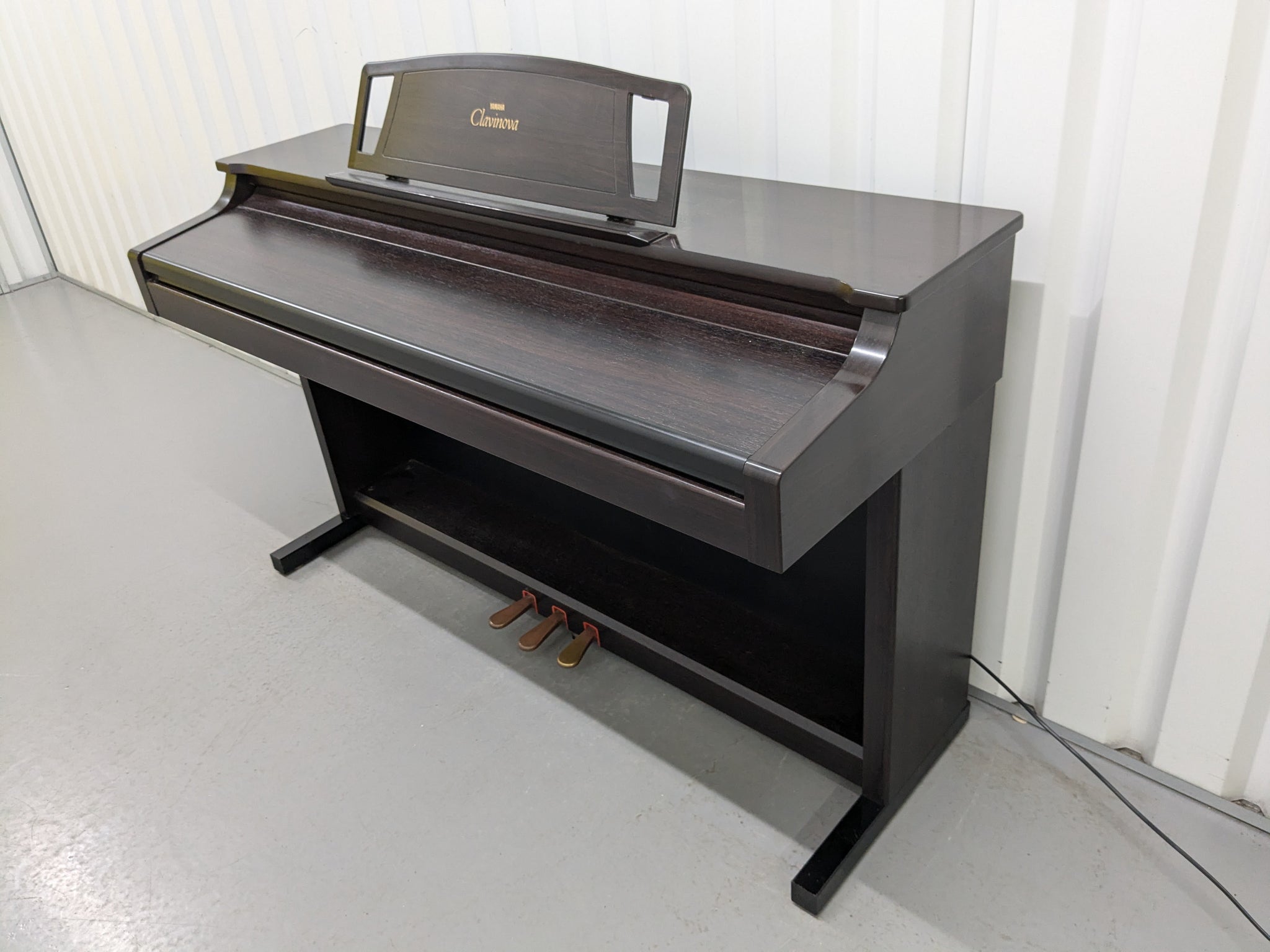 Yamaha Clavinova CLP-611 digital piano in dark Rosewood stock
