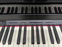 Load image into Gallery viewer, Roland HP506 Digital Piano glossy black wooden action keys + stool Stock nr 24443
