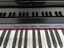 Load image into Gallery viewer, Roland HP506 Digital Piano glossy black wooden action keys + stool Stock nr 24443
