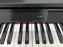 Load image into Gallery viewer, CASIO CELVIANO AP-450 DIGITAL PIANO AND STOOL IN  SATIN BLACK  stock no 24455
