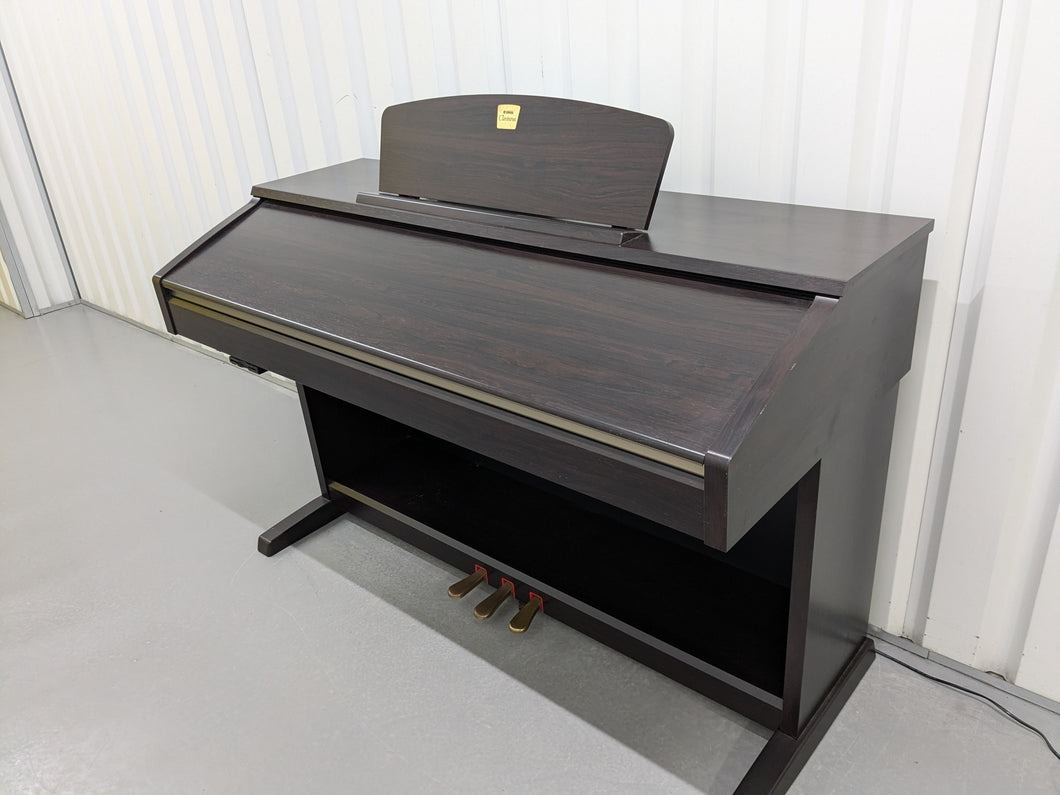 Yamaha Clavinova CVP-301 Digital Piano / arranger in rosewood. stock # 24482