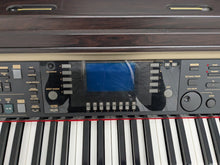 Load image into Gallery viewer, Yamaha Clavinova CVP-301 Digital Piano / arranger in rosewood. stock # 24482
