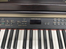 Load image into Gallery viewer, Yamaha Clavinova CLP-240 Digital Piano in dark rosewood stock nr 24487
