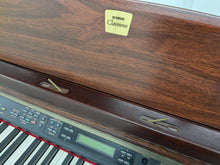 Load image into Gallery viewer, Yamaha Clavinova CLP-150 digital piano and stool in mahogany stock #24519
