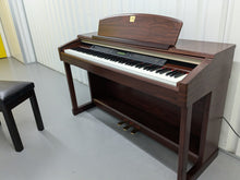 Load image into Gallery viewer, Yamaha Clavinova CLP-150 digital piano and stool in mahogany stock #24519
