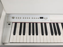 Load image into Gallery viewer, Roland F110 compact slim size Digital Piano in white  stock # 24539
