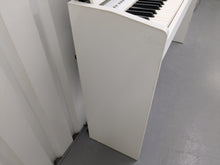 Load image into Gallery viewer, Roland F110 compact slim size Digital Piano in white  stock # 24539
