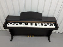 Load image into Gallery viewer, Roland HP101e Digital Piano and stool in dark rosewood finish stock # 24557
