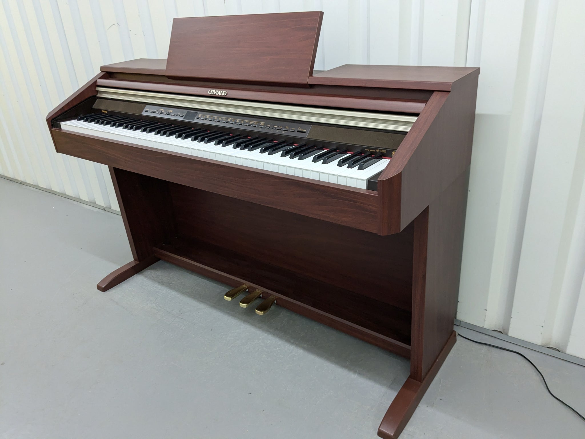 Casio Celviano AP-500 digital piano in mahogany colour stock