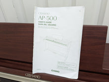 Load image into Gallery viewer, Casio Celviano AP-500 digital piano in mahogany colour stock number 24561
