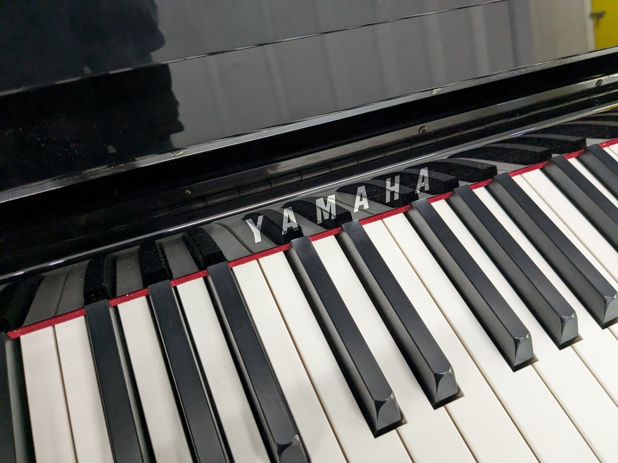 Yamaha Clavinova CLP-685 digital piano and stool in glossy black