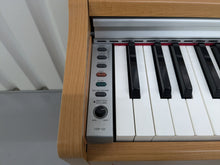 Load image into Gallery viewer, Yamaha Arius YDP-131 Digital Piano in cherry wood finish stock nr 24594
