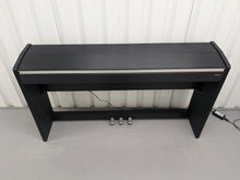 Load image into Gallery viewer, Roland F110 compact slim size Digital Piano in black  stock # 24580
