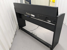 Load image into Gallery viewer, Roland F110 compact slim size Digital Piano in black  stock # 24580
