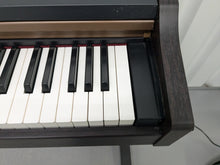 Load image into Gallery viewer, Roland HP101e Digital Piano in dark rosewood finish stock # 24589
