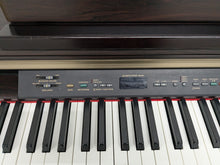 Load image into Gallery viewer, Yamaha Clavinova CLP-130 Digital Piano in rosewood stock number 24592
