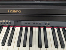 Load image into Gallery viewer, Roland RP301 digital piano in dark rosewood finish stock number 24608
