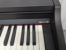 Load image into Gallery viewer, Roland RP301 digital piano in dark rosewood finish stock number 24608
