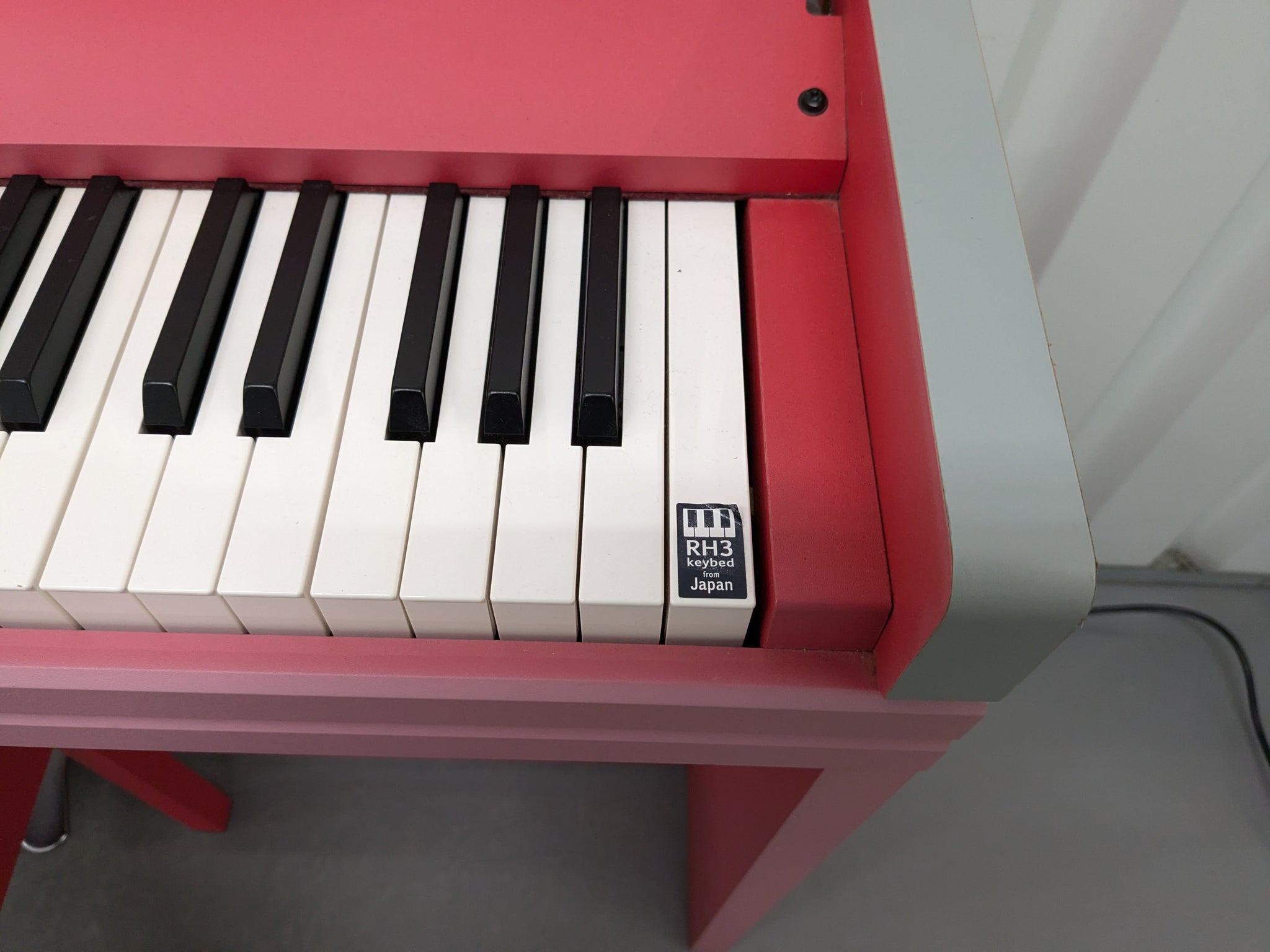 Korg LP350 compact slim size Digital Piano in pink with stool