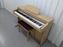 Load image into Gallery viewer, Roland HP102e digital piano and stool in light oak finish stock number 24614
