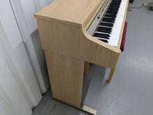 Load image into Gallery viewer, Roland HP102e digital piano and stool in light oak finish stock number 24614
