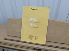 Load image into Gallery viewer, Roland HP102e digital piano and stool in light oak finish stock number 24614
