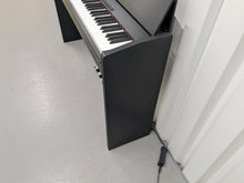 Load image into Gallery viewer, Roland F110 compact slim size Digital Piano in black  stock # 24652
