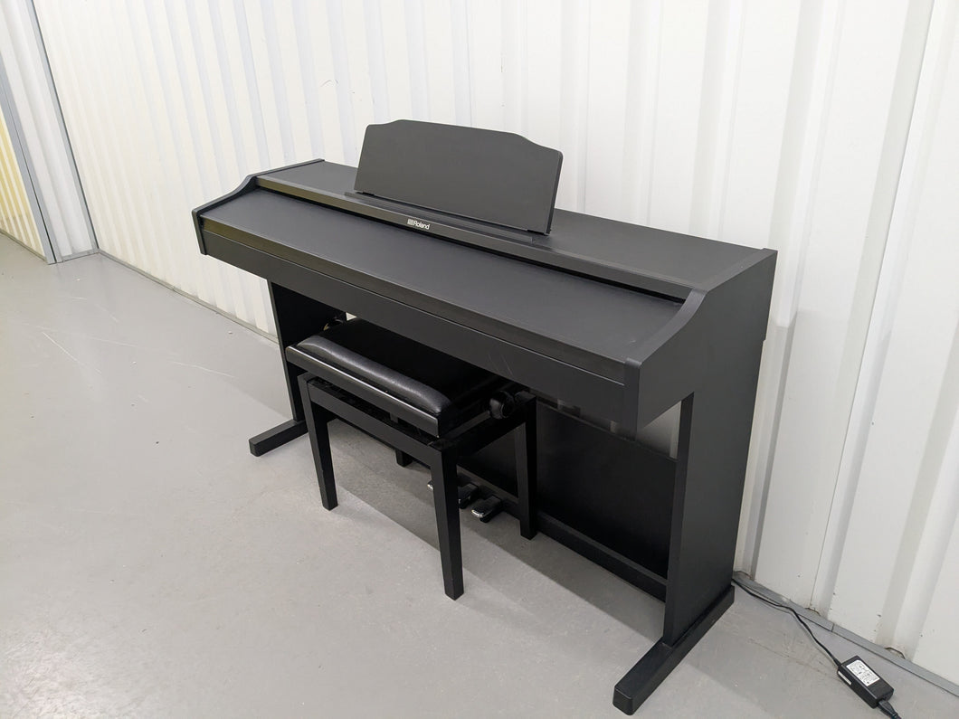 Roland RP102 digital piano and stool in satin black finish stock number 25008