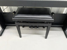 Load image into Gallery viewer, Roland RP102 digital piano and stool in satin black finish stock number 25008
