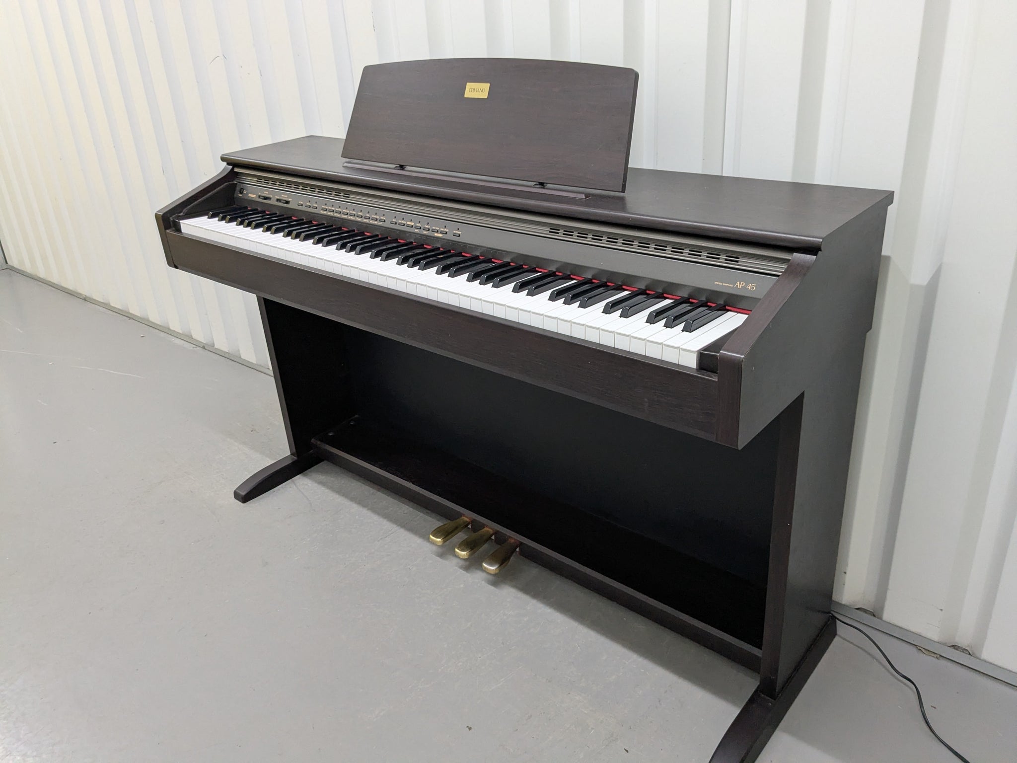 Casio Celviano AP-45 Digital Piano in dark rosewood finish, hammer