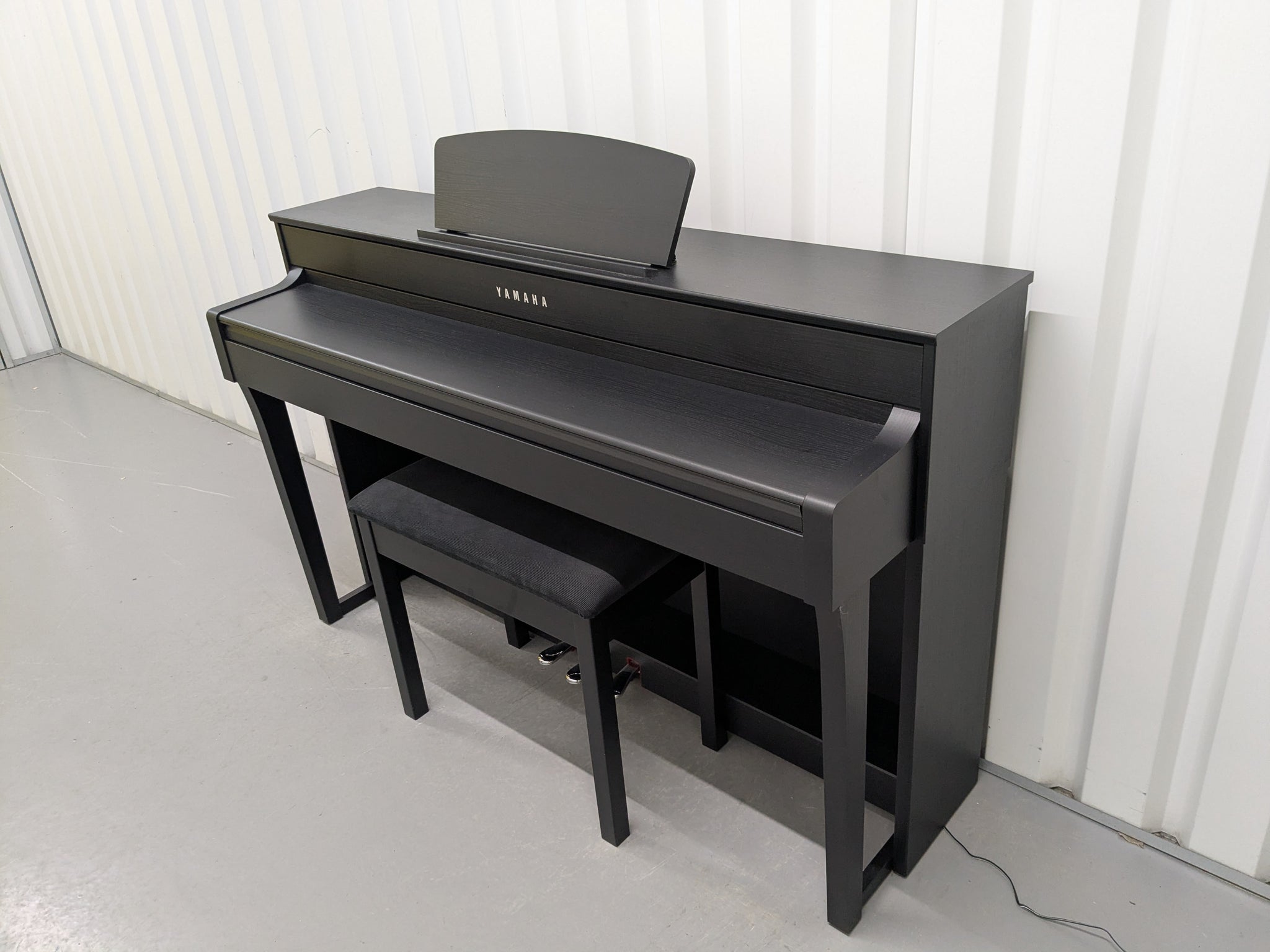 Yamaha Clavinova CLP-635 Digital Piano and stool in satin black