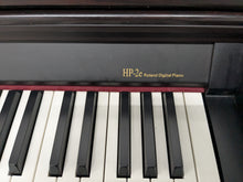 Load image into Gallery viewer, Roland HP-2e digital piano in dark rosewood finish stock number 25013
