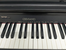 Load image into Gallery viewer, Casio Celviano AP-250 digital piano and stool in satin black finish stock number 25062
