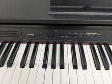 Load image into Gallery viewer, Casio Celviano AP-250 digital piano and stool in satin black finish stock number 25062
