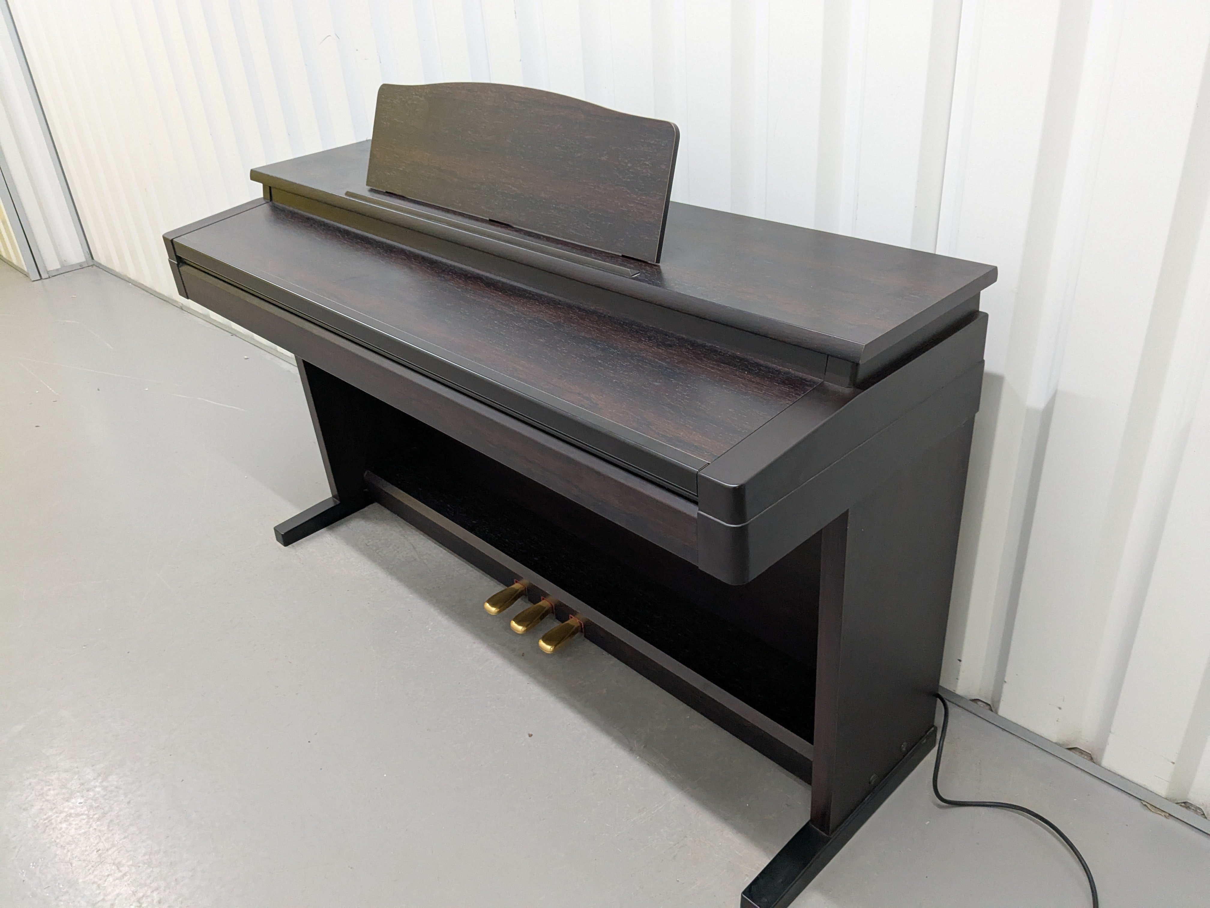 Roland HP330 digital piano in rosewood stock #25046 – Sulinda Music